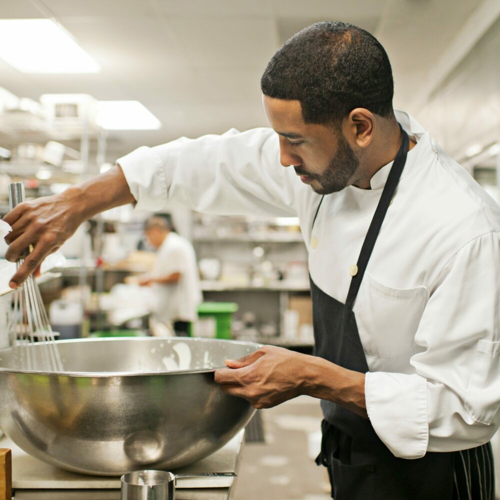 Culinarian working in a commercial kitchen