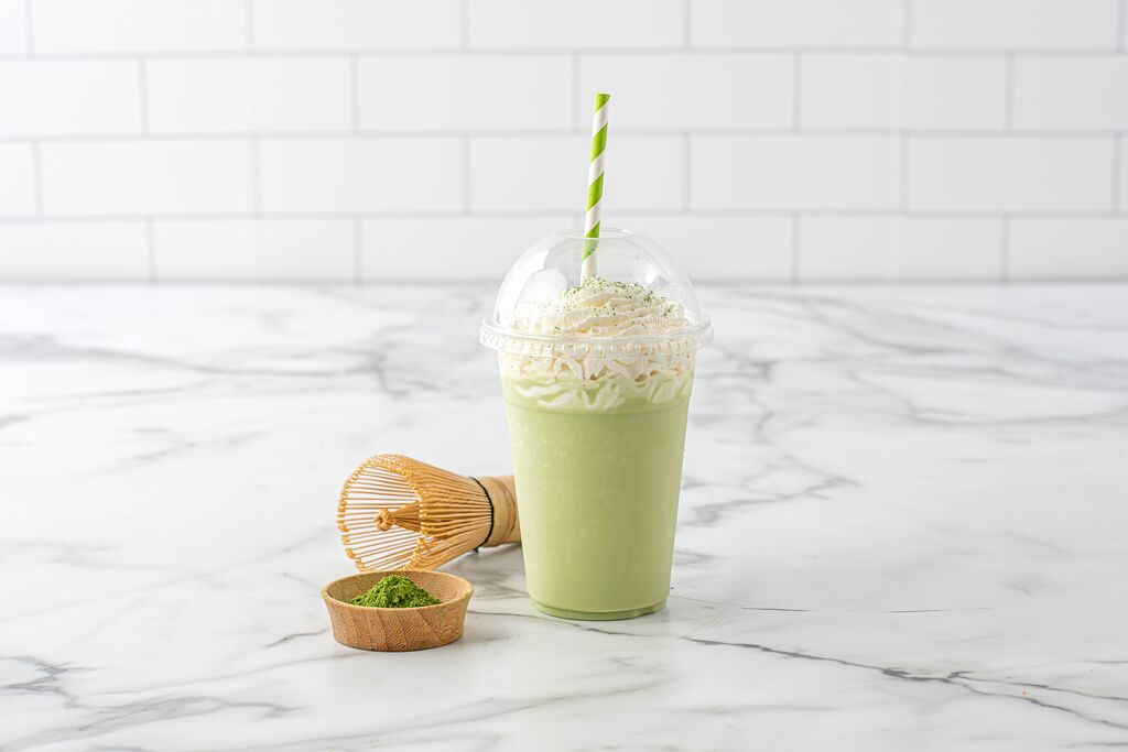Vanilla Matcha Milkshake created with the new B9 F'real blender. Topped with On Top® Original Whipped Topping and matcha powder.